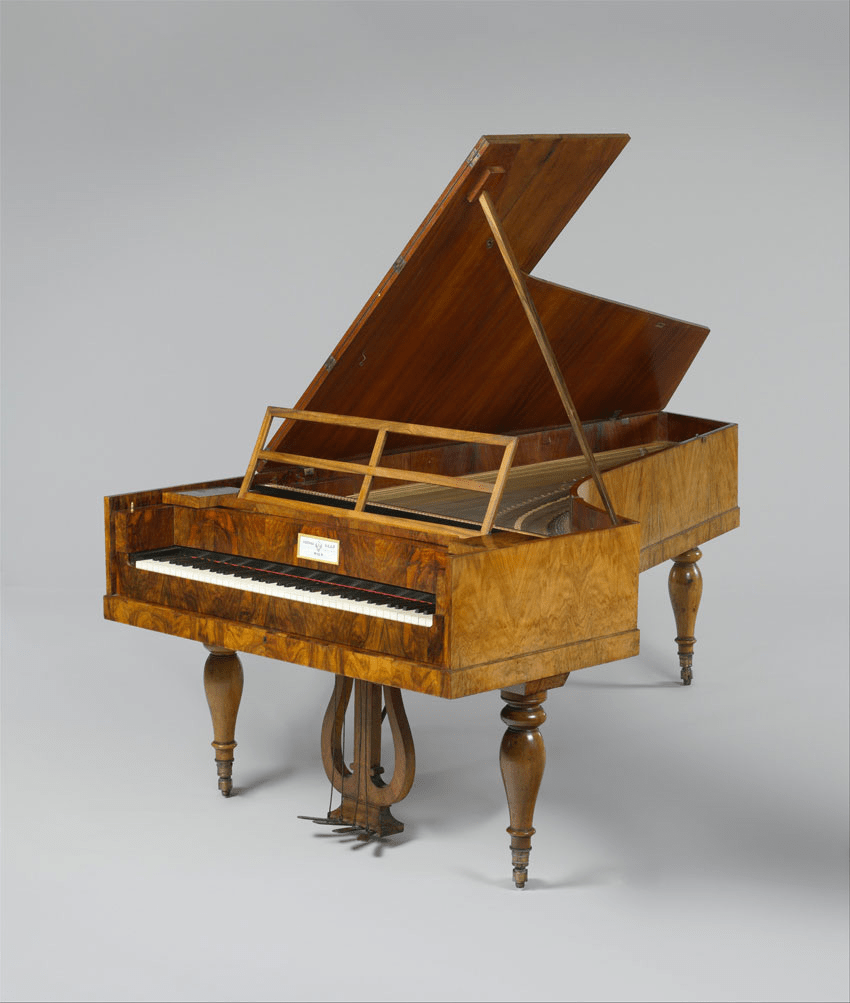 Pianoforte ancien en placage de bois précieux